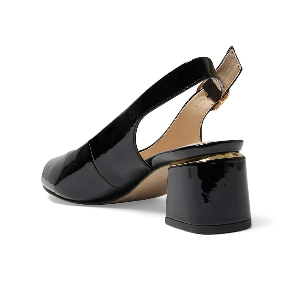 Martina Heel in Black Patent